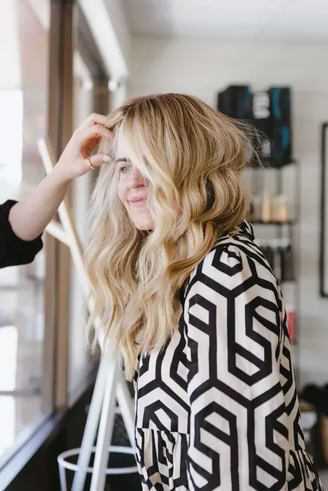 Hand-tied hair extension application