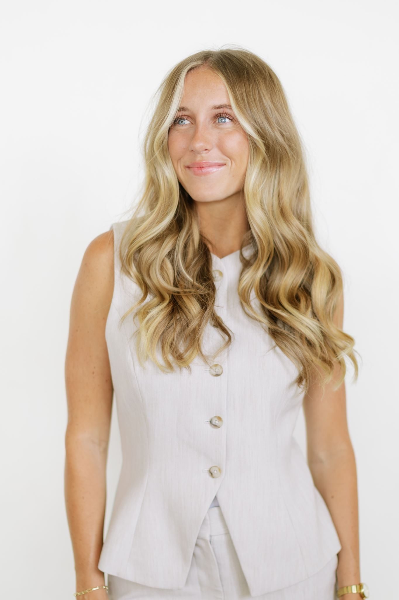 Behind the scenes of a full hand-tied hair extension install at a Utah salon